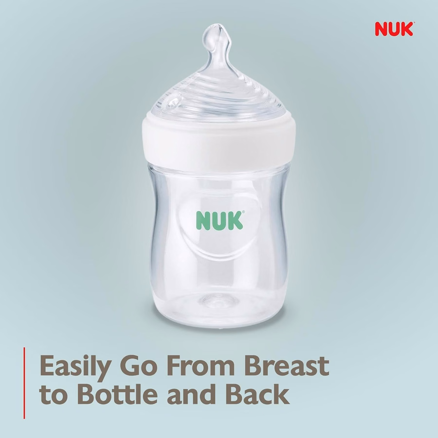 Biberón NUK Simply Natural con SafeTemp, válvula anticólicos y tetina de flujo lento para una alimentación natural, 266 ml, paquete de 4: Bebé