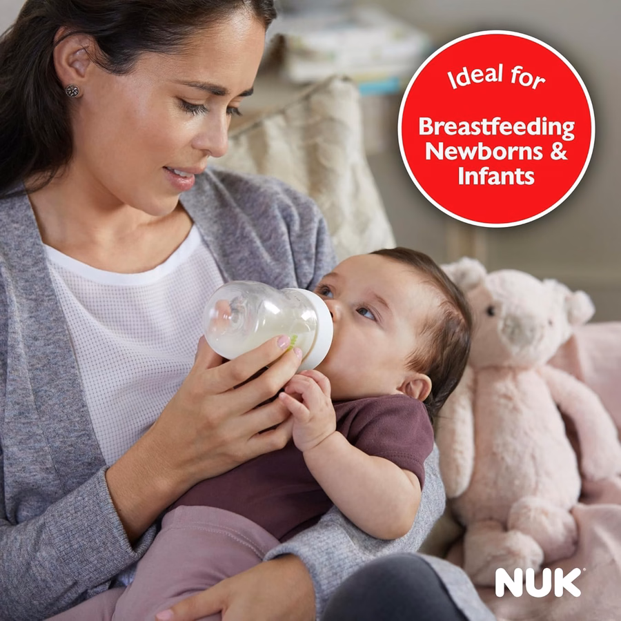 Biberón NUK Simply Natural con SafeTemp, válvula anticólicos y tetina de flujo lento para una alimentación natural, 266 ml, paquete de 4: Bebé